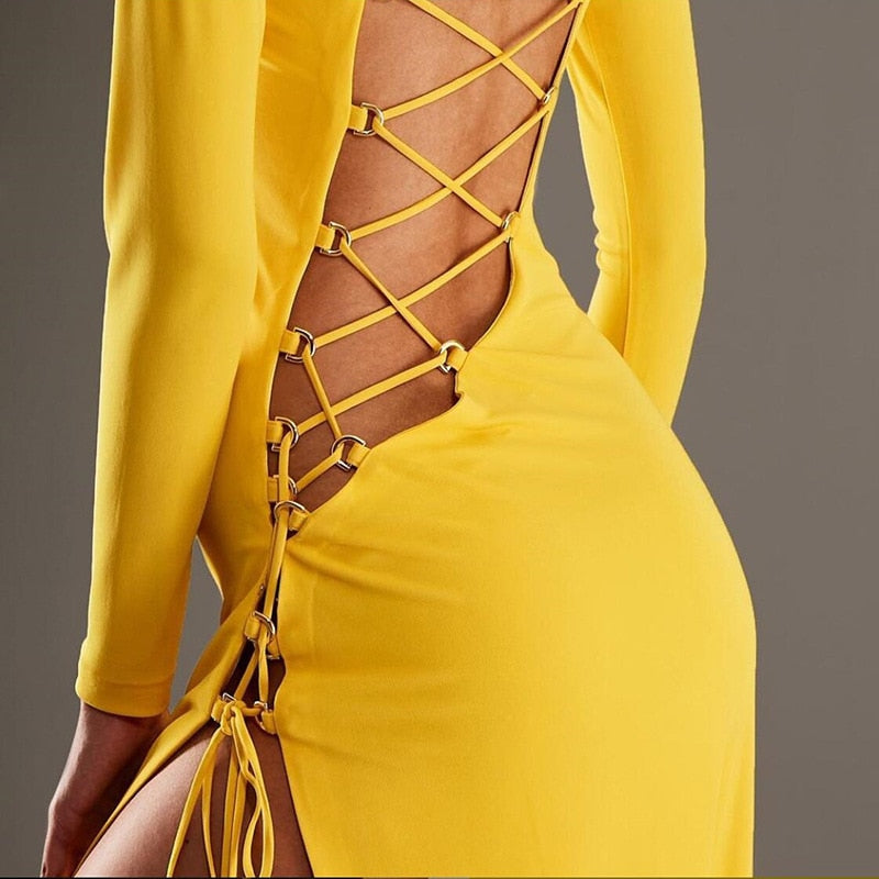 Herbst neue Damenmode Rundhals Langarm sexy hohles offenes Rücken-Split-Kleid