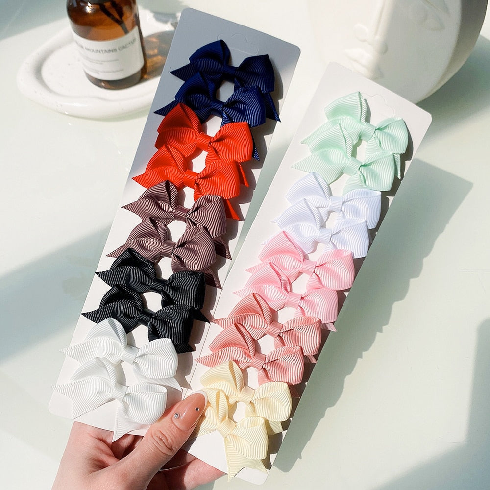 10Pcs/Set neue solide Band Bowknot Haarspangen für Baby Mädchen, handgemachte niedliche HaarnadelsBögen